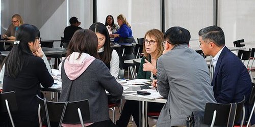 A group of people engaged in a meeting.