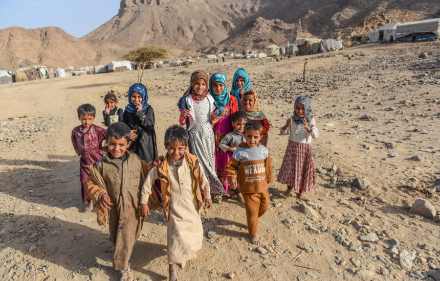 A group of children in the dessert