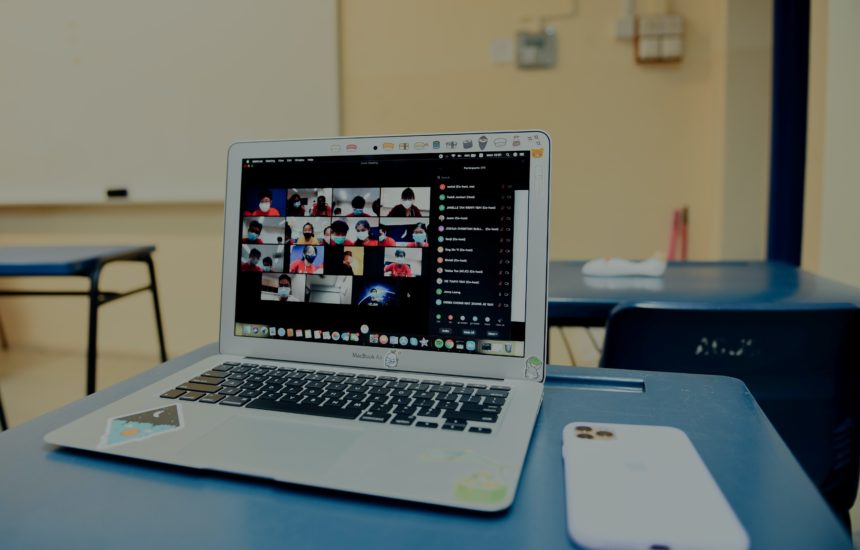 Computer showing a Zoom meeting in a classroom